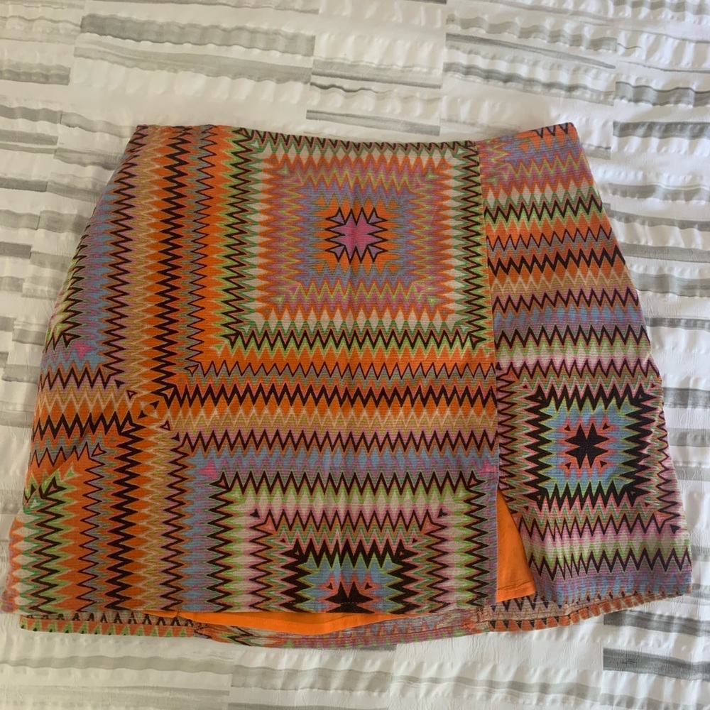 Multicolored pattern miniskirt from Urban Outfitters in size Medium